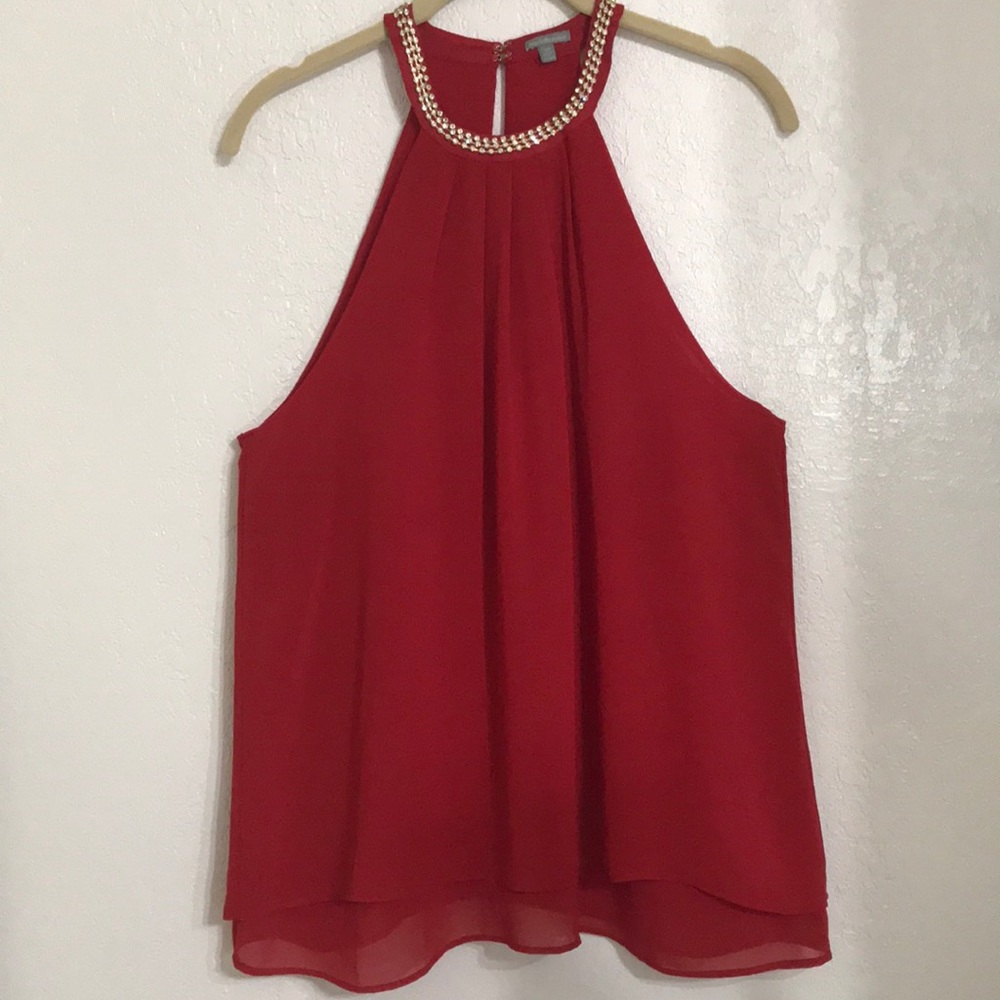 Red halter neck w gold embellishments by the neck